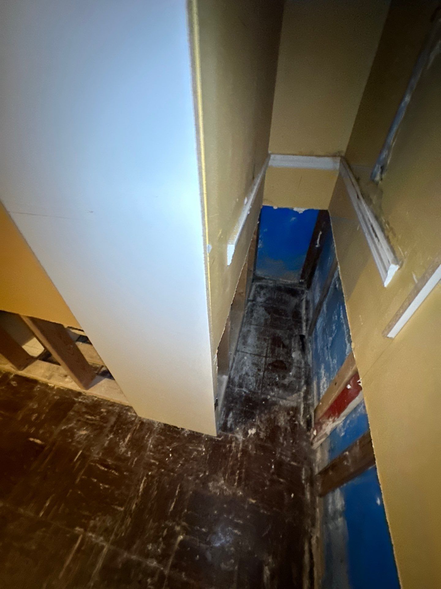 Flooded hallway with water damage during a ServicePros job